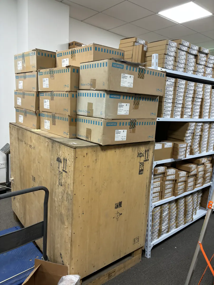 Wooden crate and cartons in the warehouse